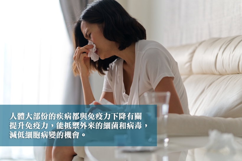 Asian woman sitting on sofa at home having a cold fever using ti